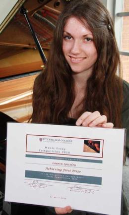 Lauren shows her certificate.