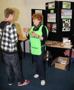 Student finding out about a local charity and how to volunteer
