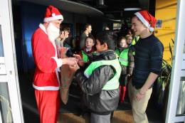 Santa gives out gifts